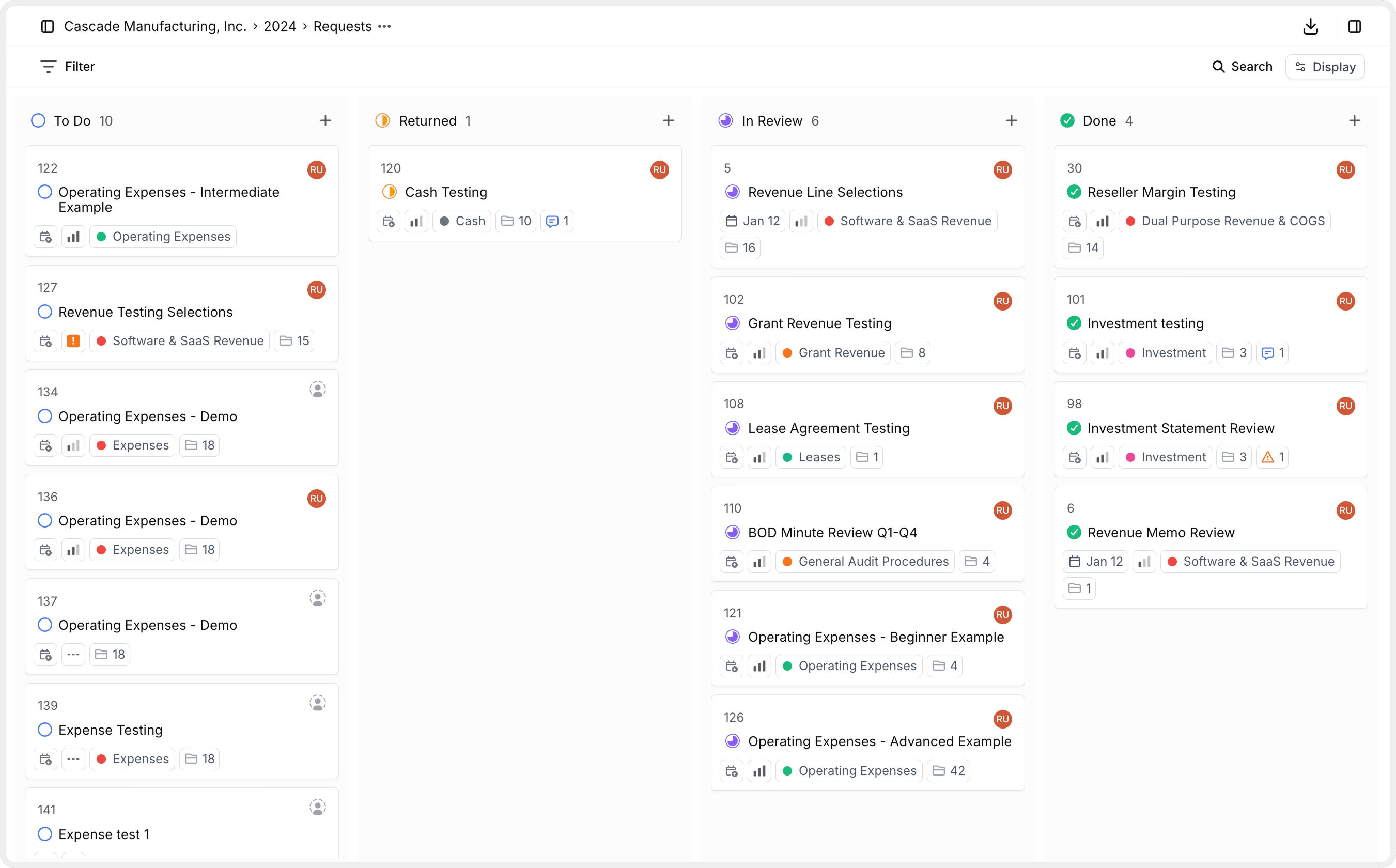A request showing the title, status, assignee, itemized upload area, and comment thread